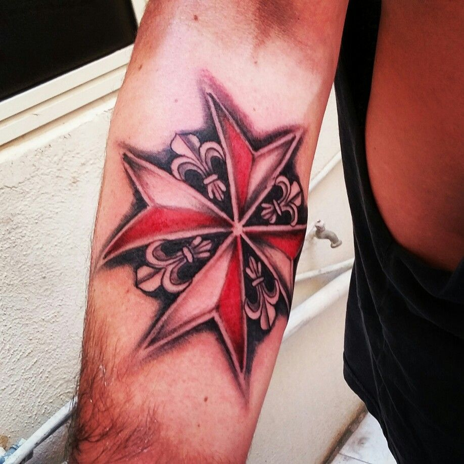 Maltese cross tattoo