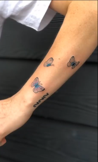 small butterfly tattoos on wrist