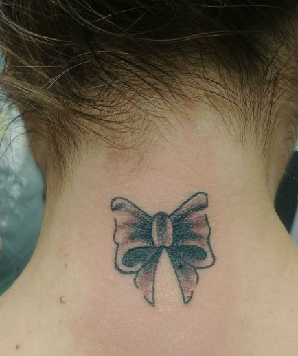 small butterfly neck tattoos