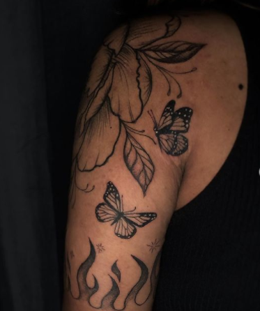 small butterfly tattoos on arm
