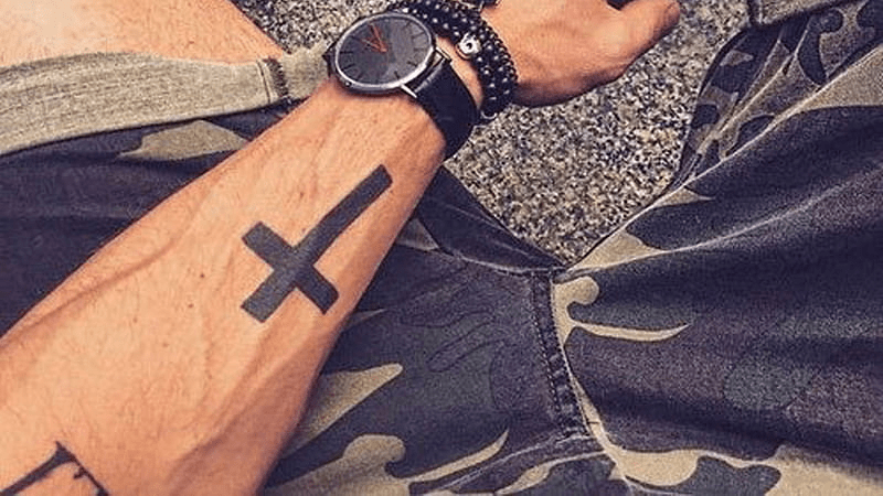 Share more than 87 men's cross tattoos arm - thtantai2