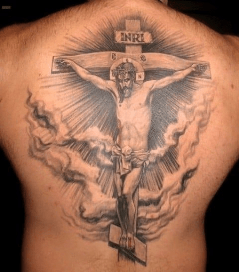 Lewis Hamiltons back tattoo of a cross and angel wings