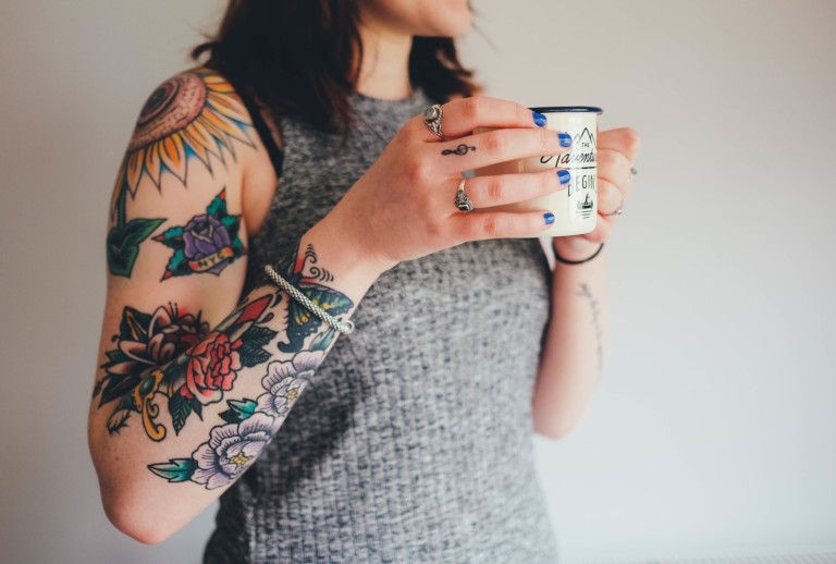 female-classy-half-sleeve-tattoo