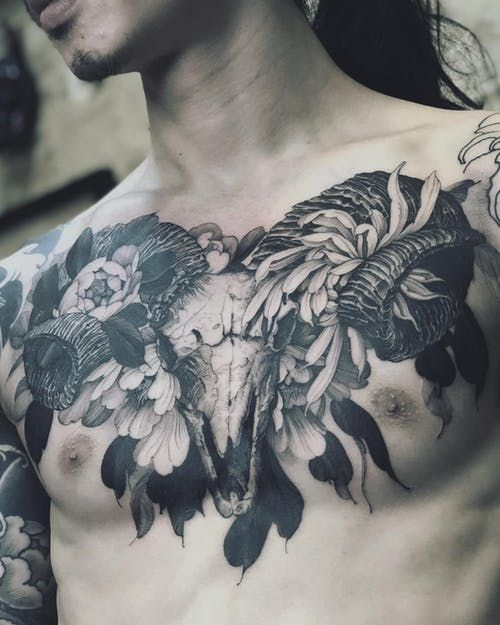 55 Awesome Chest Tattoos For Men Ideas