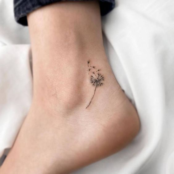 Girly foot tattoo