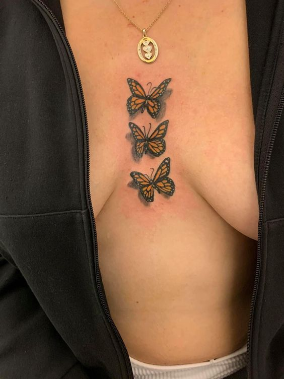 3D Monrach butterfly tattoo on sternum