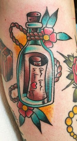Tattoos with a Bottle with a Note
