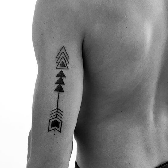Single needle compass tattoo on the back of the left