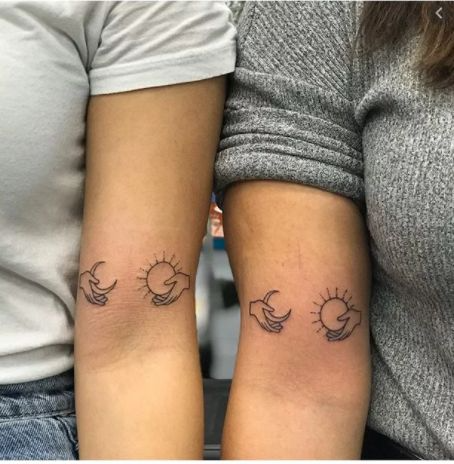 Space-inspired best friend tattoos