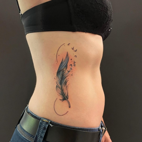TOP 10 FEATHER TATTOO IDEAS + MEANINGS FOR 2023 - alexie