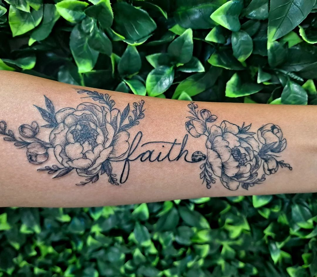 Symbols in faith tattoos