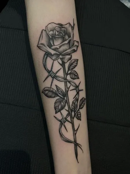Barbed wire rose tattoo meaning