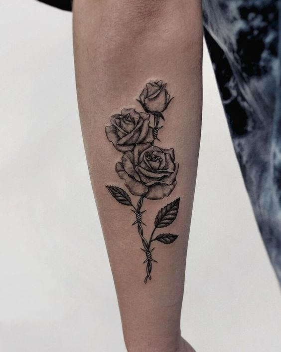 Barbed wire rose tattoo