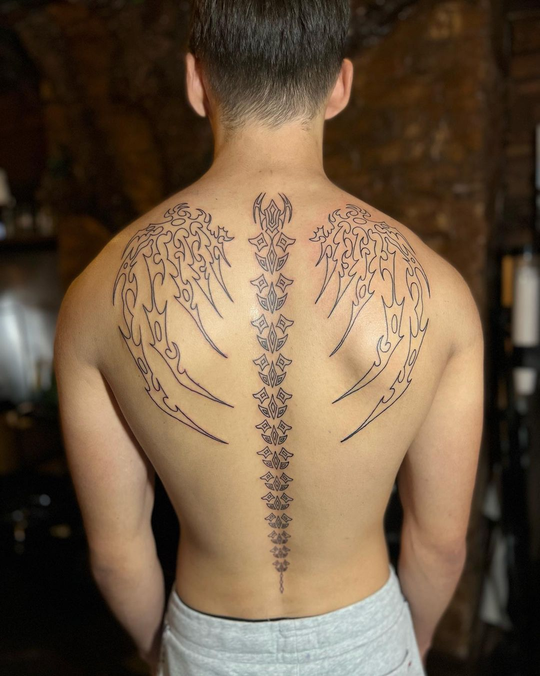 Top 73 Spine Tattoo Ideas For Guys 2021 Inspiration Guide  Spine tattoo  for men Back tattoos for guys Spine tattoos