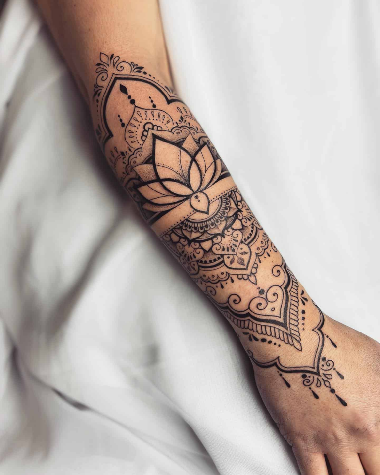 Mandala tatoo on a hand