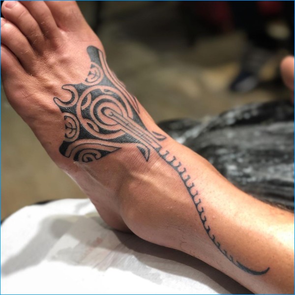 Hawaiian tattoo motifs on the foot
