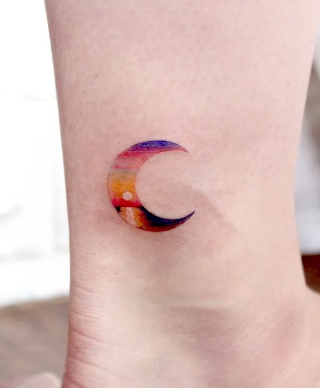 Ankle moon tattoo