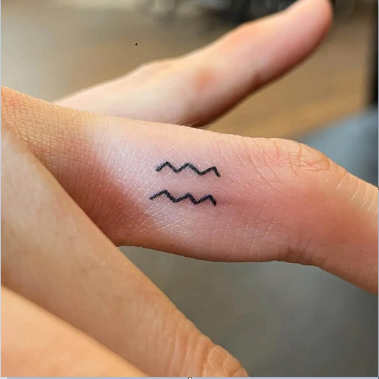 Small finger tattoo by Łukasz Krupiński  Tattoogridnet