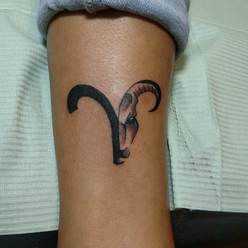 Single needle ram skull tattoo located on the forearm