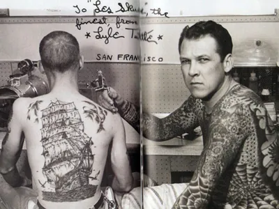 Lyle Tuttle working in his tattoo studio