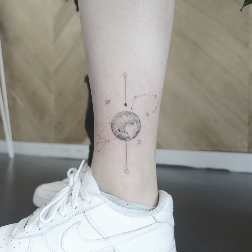 Pluto is the ruling planet for Scorpios, which is responsible for transformation and destruction. Of course, you can make it a central theme of your tattoo.