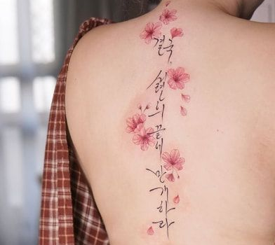 10 Best Flower Spine Tattoo IdeasCollected By Daily Hind News