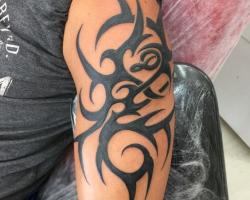 Tribal tattoo on arm