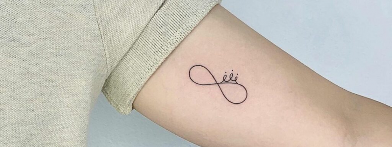 Side tattoo of the infinity symbol on Vane.