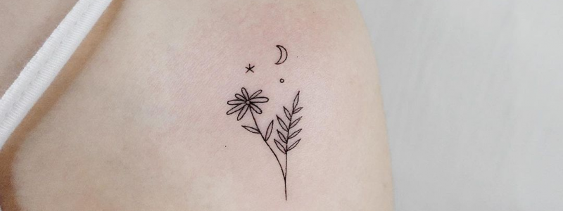 Daisy tattoo on the soulder