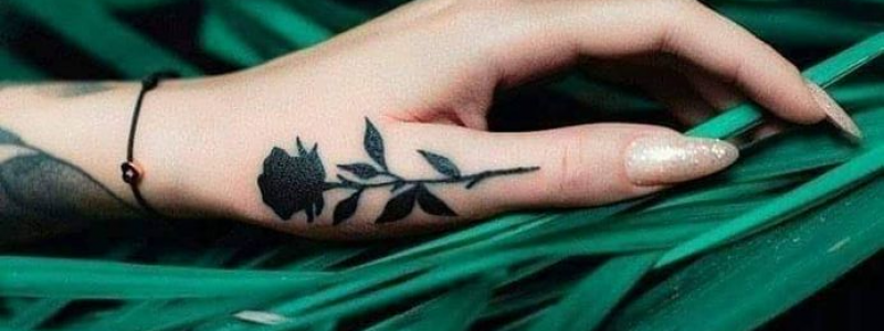 Black Shaded Rose Hand Tattoo For Girls