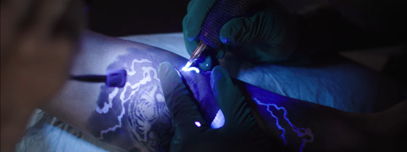 Amazing UV Tattoos Glow With Blue 'UVealism' in The Right Light